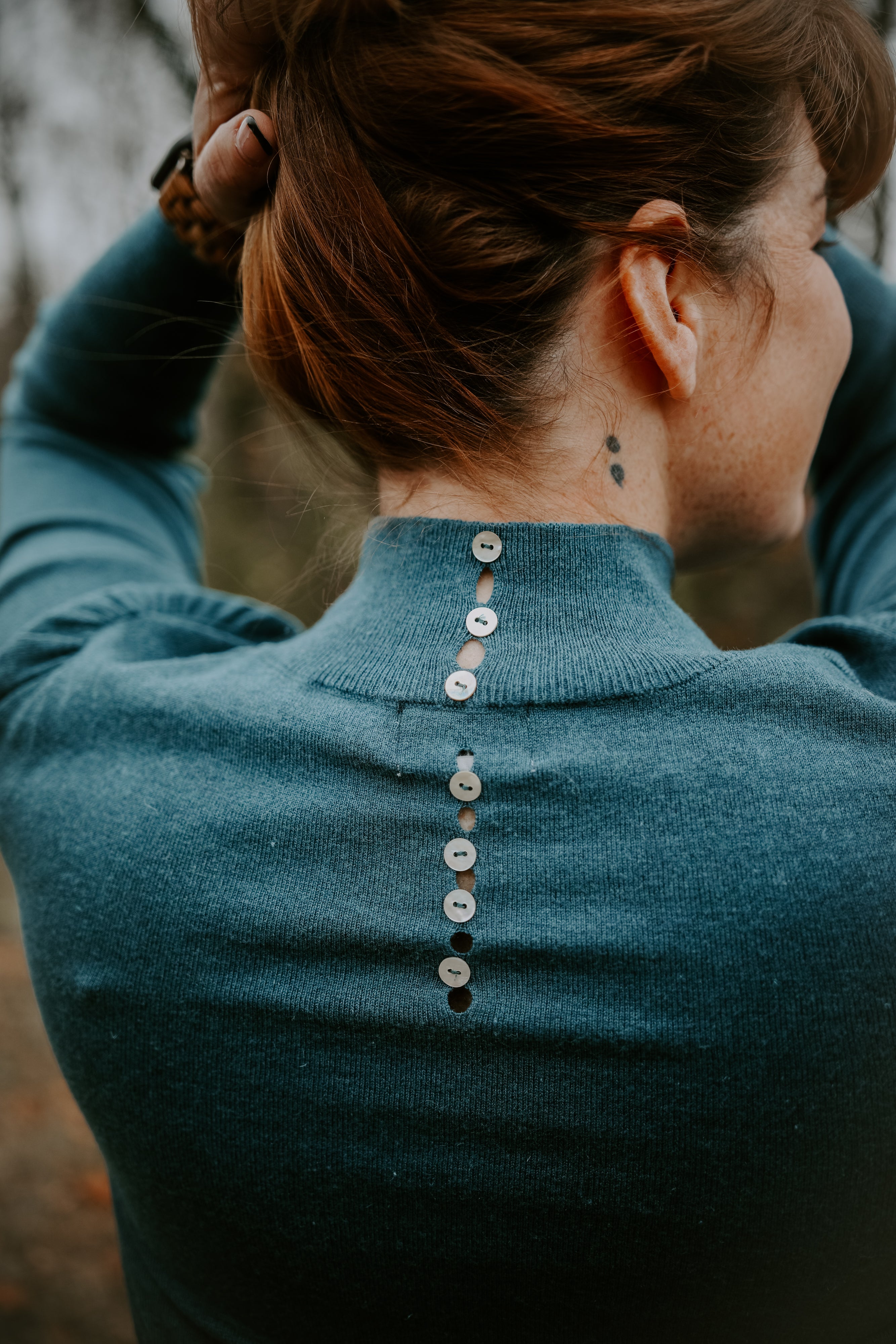 Buttoned-Up Elegance Sweater